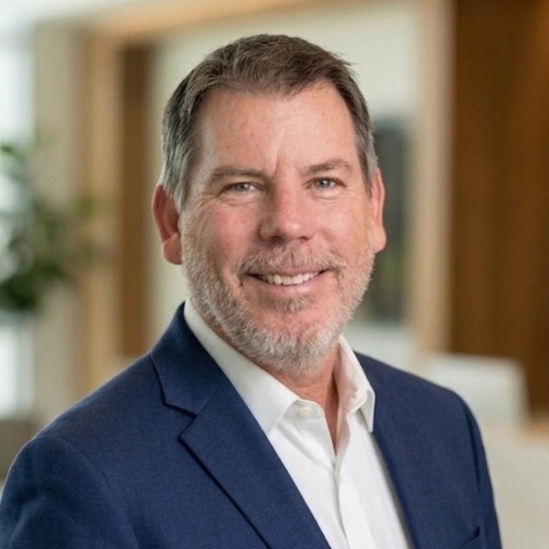 John Kirker, strategic technology and marketing advisor, in a navy blazer